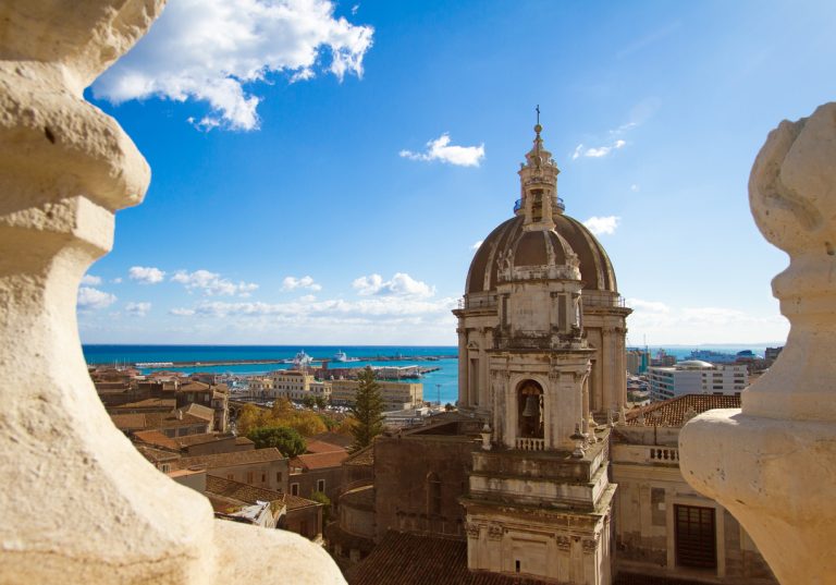 catania-sicily-old-town-panorama-with-cathedral-cupola-and-sea