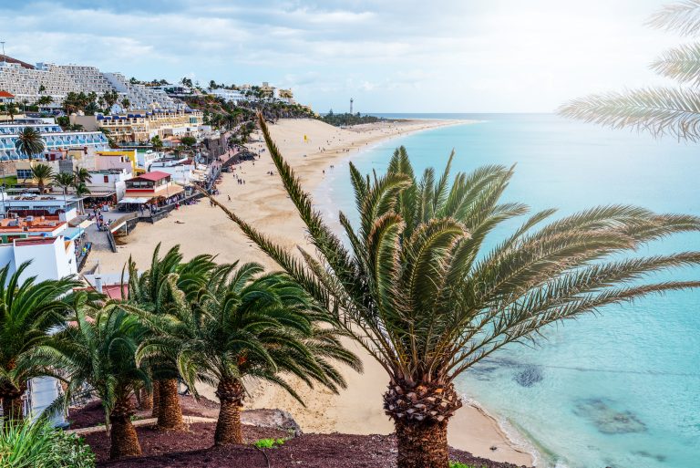 high-angle-view-over-town-of-morro-jable-on-fuerteventura-island-with-beach-and-ocean