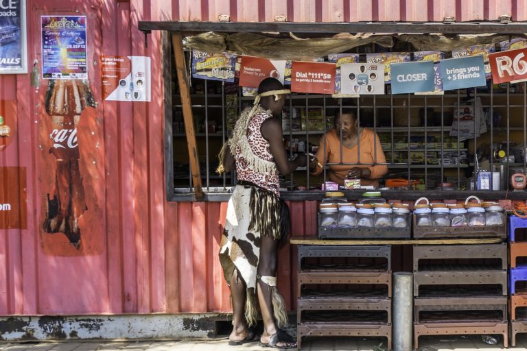 african-man-shopping-at-the-spaza