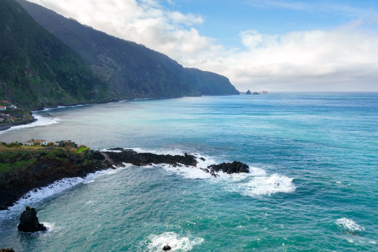 beautiful-black-rock-beach-in-seixal-madeira-with-waves-crashing